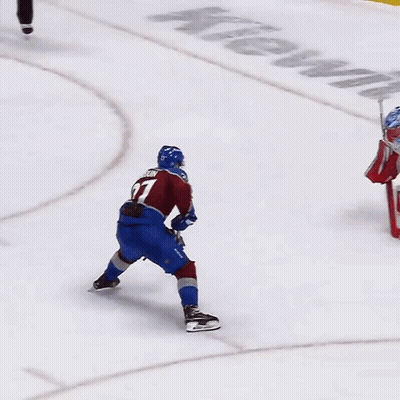 A Hockey Player With The Number 21 On His Jersey GIF