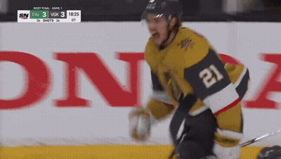 A Hockey Player With The Number 21 On His Jersey Is On The Ice GIF