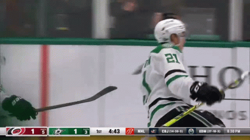 A Hockey Player With The Number 21 On His Jersey Is On The Ice GIF