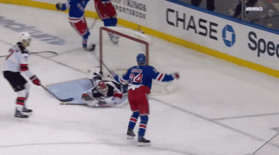 A Hockey Player With The Number 24 On Their Jersey GIF