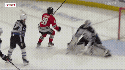 A Hockey Player With The Number 28 On His Back GIF