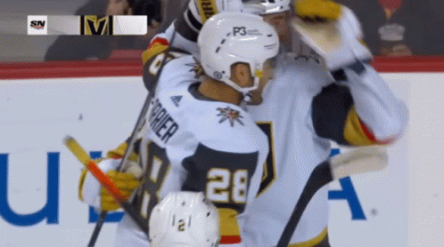 A Hockey Player With The Number 28 On Their Jersey GIF