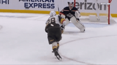 A Hockey Player With The Number 28 On Their Jersey GIF