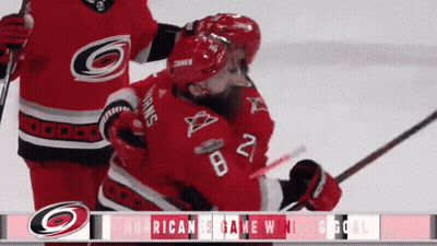 A Hockey Player With The Number 28 On Their Jersey GIF