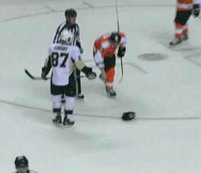 A Hockey Player With The Number 32 On His Back GIF