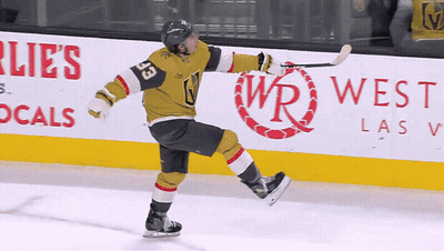 A Hockey Player With The Number 33 On His Jersey Skates On The Ice GIF