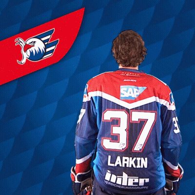 A Hockey Player With The Number 37 On His Back GIF