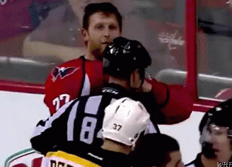 A Hockey Player With The Number 37 On Their Helmet GIF