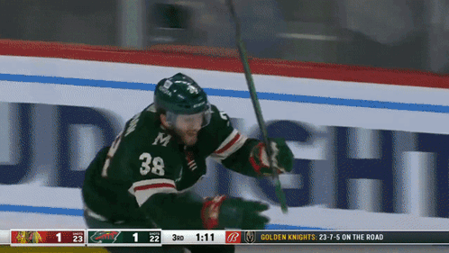 A Hockey Player With The Number 38 On His Uniform GIF