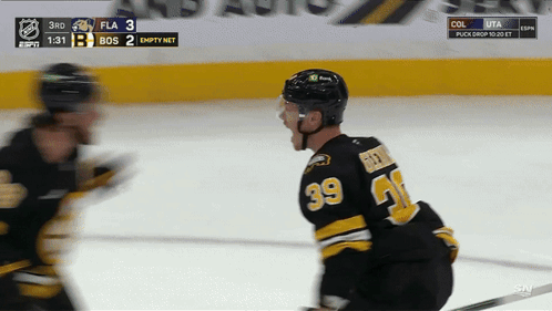 A Hockey Player With The Number 39 On His Back GIF