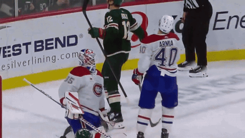 A Hockey Player With The Number 40 On Their Jersey GIF