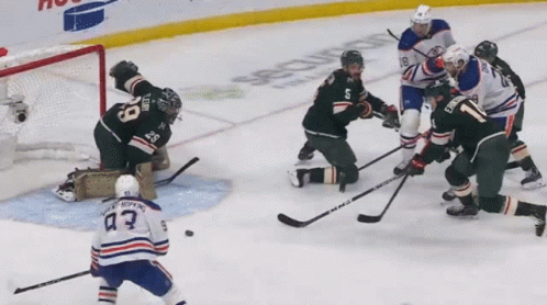 A Hockey Player With The Number 43 On His Back GIF