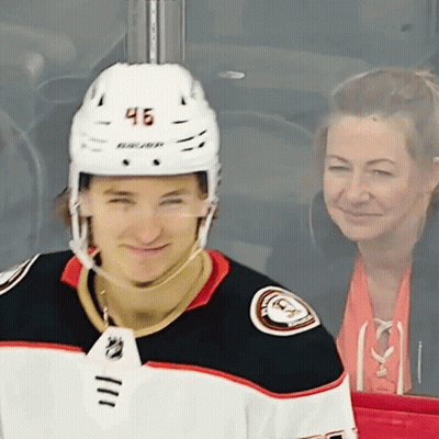A Hockey Player With The Number 46 On His Helmet Is Smiling GIF