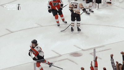 A Hockey Player With The Number 46 On His Jersey Is Being Lifted In The Air By Fans GIF