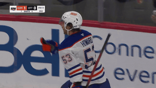 A Hockey Player With The Number 53 On His Back GIF