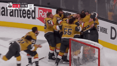 A Hockey Player With The Number 55 On His Jersey Is Hugging His Teammates GIF