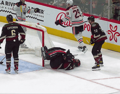 A Hockey Player With The Number 6 On His Back GIF