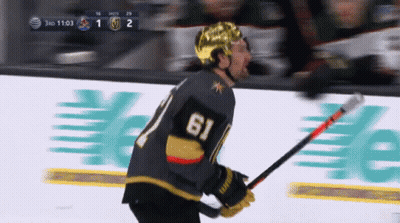 A Hockey Player With The Number 61 On His Back GIF