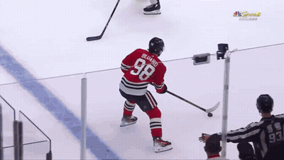 A Hockey Player With The Number 68 On His Shirt GIF