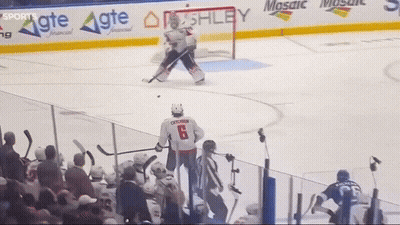 A Hockey Player With The Number 79 On The Back Of His Jersey GIF