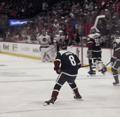 A Hockey Player With The Number 8 On His Jersey Stands On The Ice GIF