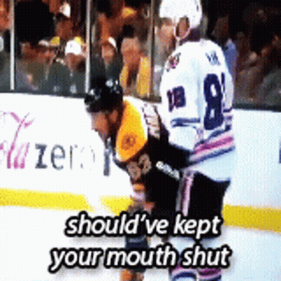 A Hockey Player With The Number 8 On His Jersey Stands On The Ice GIF