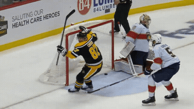 A Hockey Player With The Number 81 On His Shirt GIF