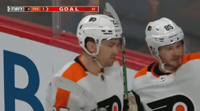 A Hockey Player With The Number 86 On His Helmet Is Holding A Hockey Stick GIF