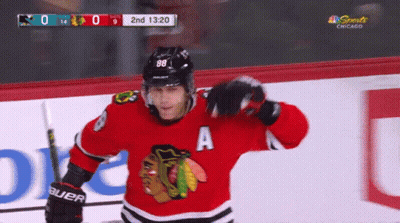 A Hockey Player With The Number 88 On His Helmet GIF