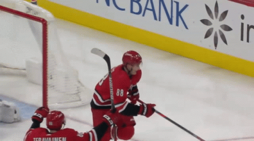 A Hockey Player With The Number 88 On His Jersey Is On The Ice GIF