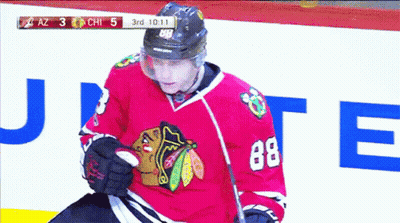 A Hockey Player With The Number 88 On His Shirt GIF