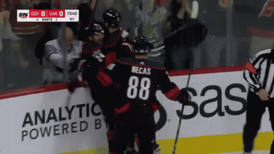 A Hockey Player With The Number 88 On Their Back GIF