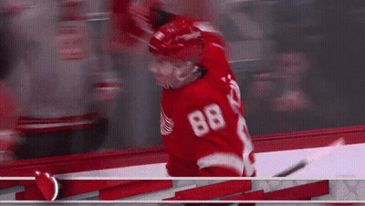 A Hockey Player With The Number 88 On Their Jersey GIF