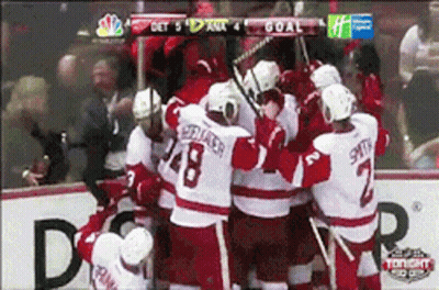 A Hockey Team Celebrates A Goal On Nbc GIF