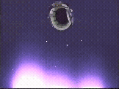 A Hole In A Wall With A Purple Light Coming Out Of It GIF