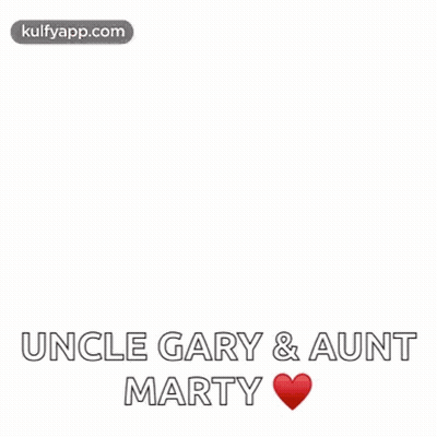 A Hot Air Balloon In The Shape Of A Heart Is Flying Over A Box . GIF