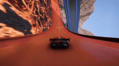 A Hot Wheels Car Is Going Down A Very Curvy Track GIF