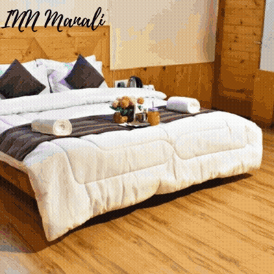A Hotel Room With A Bed And A Sign That Says ' Imm Marali ' On It GIF