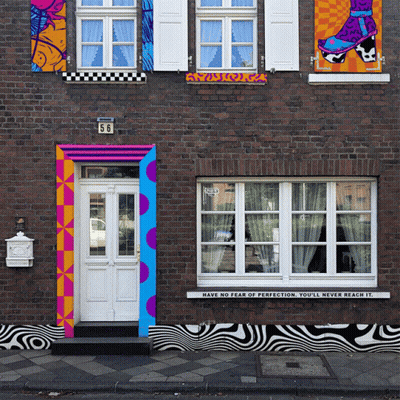 A House With A Sign That Says Have No Fear Of Perfection GIF