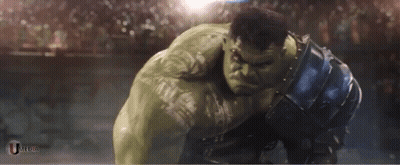 A Hulk Holding A Hammer In Front Of A Crowd With The Letters Tfdc On The Bottom GIF
