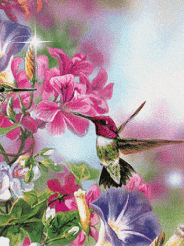 A Hummingbird Is Perched On A Flower In A Garden GIF