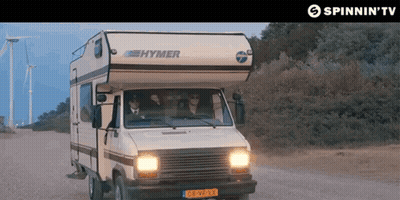 A Hymer Camper Is Driving Down A Dirt Road GIF
