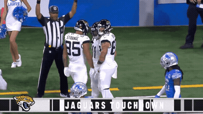 A Jaguars Touchdown Is Being Displayed On A Television Screen GIF