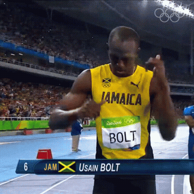 A Jamaica Athlete Named Usain Bolt Is Standing On A Track GIF