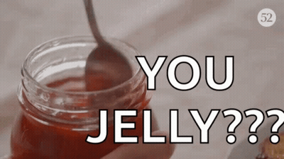 A Jar Of Jelly With A Spoon And The Words You Jelly GIF