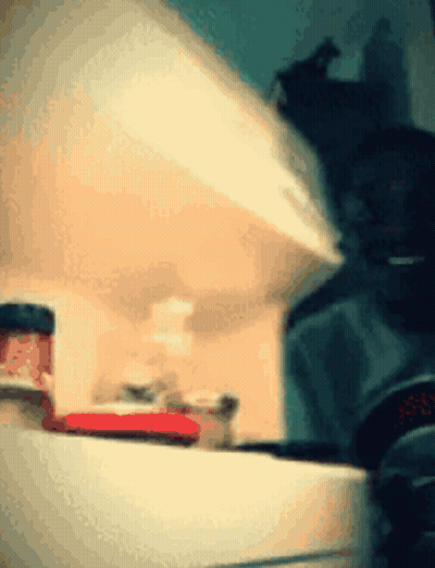 A Jar Of Strawberry Jam Sits On A Shelf GIF