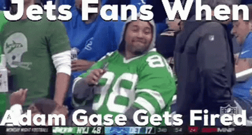 A Jets Fan Wearing A Green Jersey With The Number 78 On It GIF