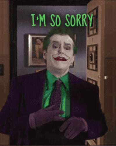 A Joker Says I 'M So Sorry While Wearing A Purple Suit And Tie GIF