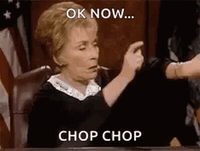 A Judge Is Sitting In A Courtroom And Giving A Thumbs Up . GIF