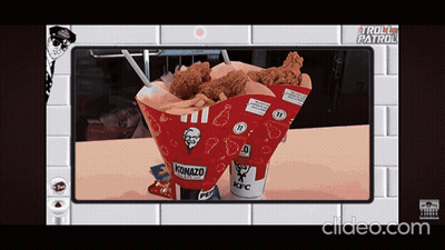 A Kfc Cone With Fried Chicken And French Fries On A Table GIF